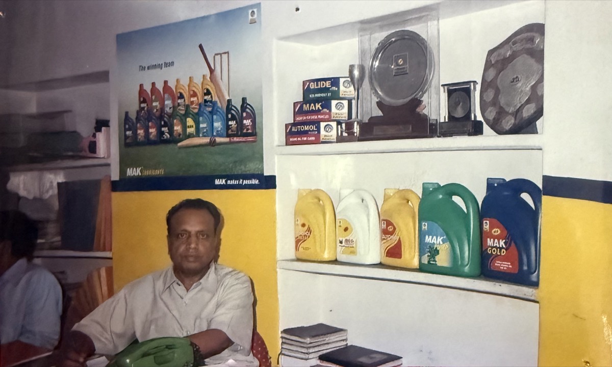 Lubes Centre shop interior — MAK product display, trophies and awards on shelf